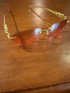 Cartier Rimless Sunglasses with Rose-Tinted Lenses and Gold Temples